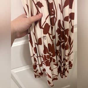 Tarte halter dress. Never worn, without tags. There is a small cut on front